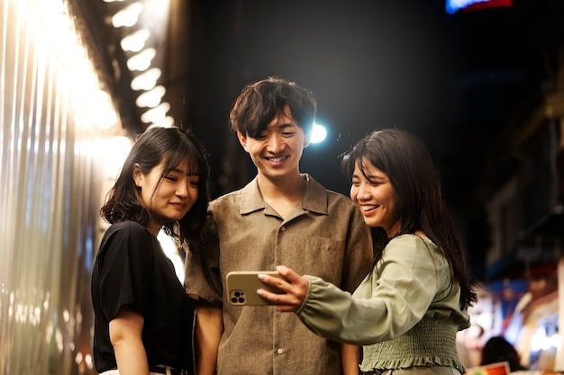 A group of Korean actors smiling and interacting playfully during a behind-the-scenes moment on the set of a dorama. The image should convey the close-knit and collaborative nature of dorama productions.