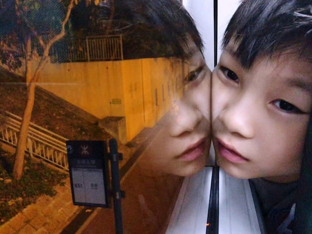 A split image showcasing a scene from a Korean drama on one side and a close-up of a music player app on a smartphone on the other. The drama scene shows two main characters in a romantic setting, while the music player displays the OST of the drama playing.