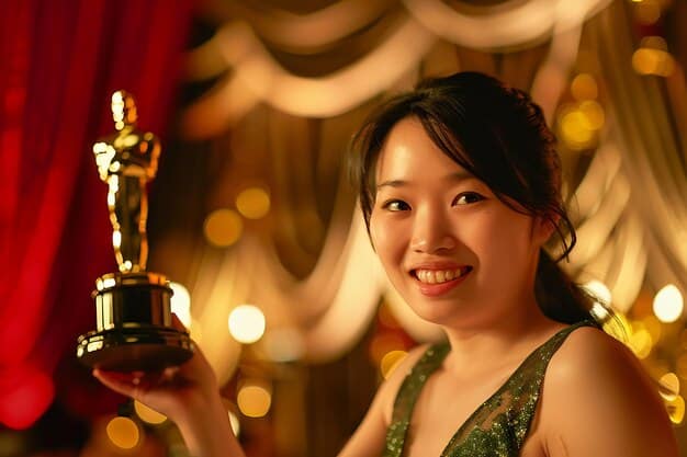 A close-up of a trophy being held by a graceful actress at a K-drama awards show, with blurred lights in the background.