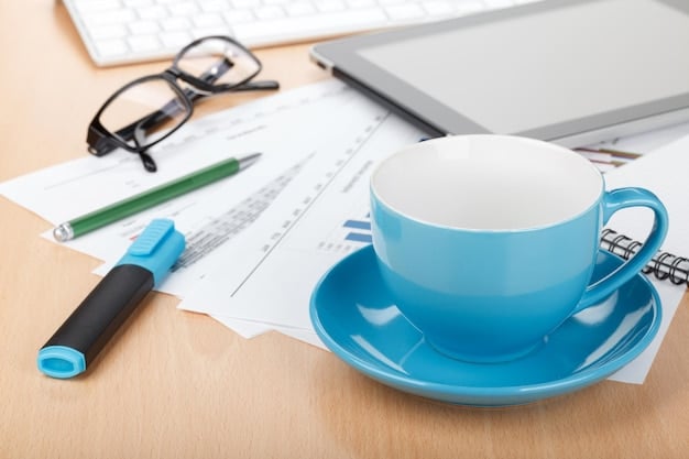 A close-up shot of an official workplace policy document laying on a office desk with a cup of coffee and office supplies. The color scheme is bright and modern with white, light blue and gray colors.