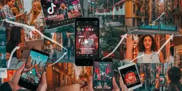 Mujer joven viendo videos de formato corto en su móvil con el skyline de Madrid de fondo, simbolizando el auge del video marketing en España.